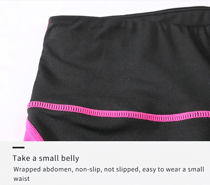 Close-up of elastic high-waisted patchwork sports shorts with pink stitching detail, designed for yoga and comfort.